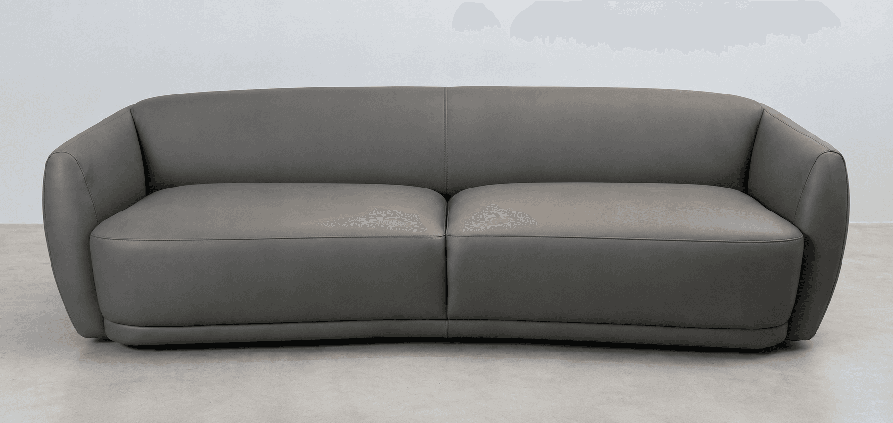 A modern two-seater loveseat upholstered in smooth gray leather, featuring a curved back and integrated armrests. The sofa has a sleek, low-profile design with no visible legs, and the seating consists of two plush, distinct cushions. — 3D model