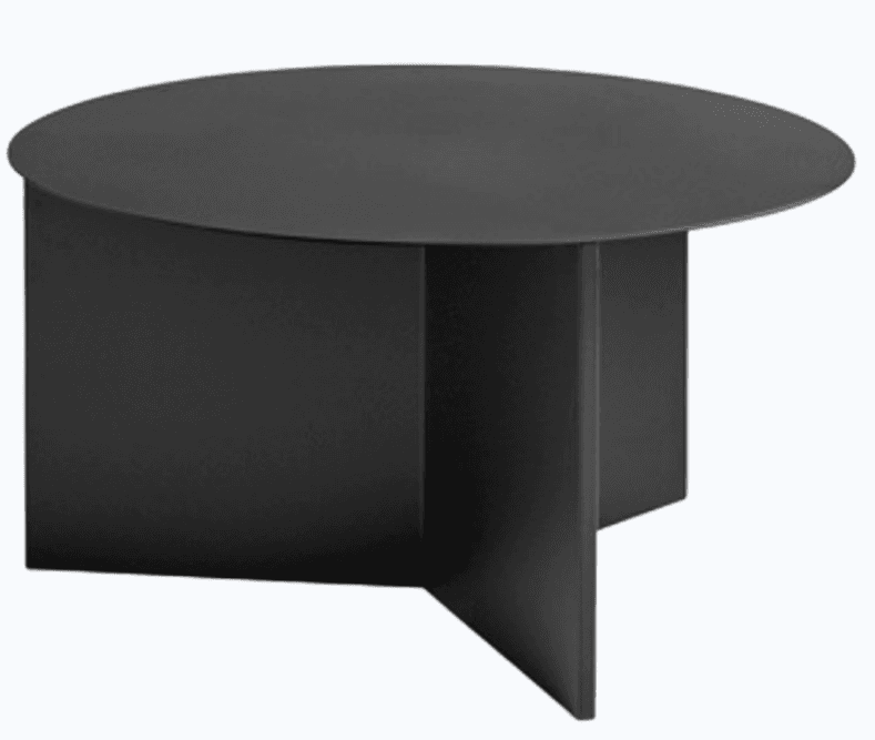 A modern, circular coffee table with a minimalist design. The tabletop is a flat, wide disc, and the base consists of four angular, interlocking supports that form a stable pedestal. — 3D model