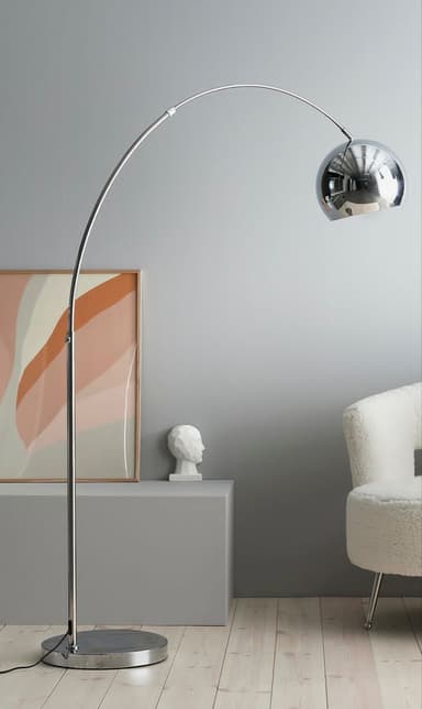 A modern arc floor lamp with a sleek, curved metal arm extending from a vertical pole. The lamp features a spherical shade, likely made of glass or polished metal, suspended at the end of the arc. It stands on a circular, weighted base. — 3D model
