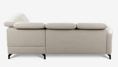 An L-shaped sectional sofa upholstered in a light beige or off-white material, likely leather or faux leather. It features a three-seater section connected to a right-hand facing chaise lounge. The backrests have distinctive padded headrest sections, and the sofa rests on sleek, minimalist black metal legs. — 3D model