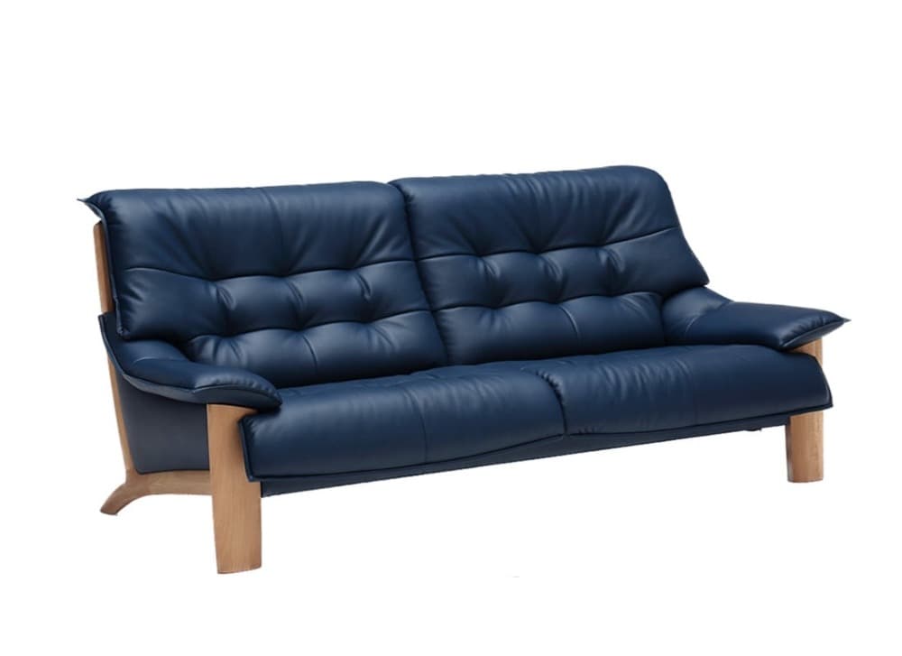 A mid-century modern style sofa upholstered in deep blue leather. It features a tufted backrest and seat cushions, with smooth, rounded armrests. The sofa is supported by a visible light wood frame, including legs and side supports, which contrast with the darker upholstery. — 3D model