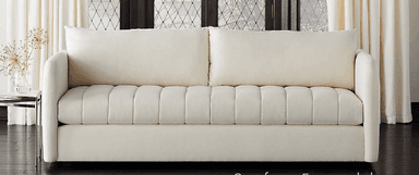 A modern three-seater sofa upholstered in a light-colored fabric. It features clean lines, wide track arms, and vertically channel-tufted seat cushions with two loose back cushions. — 3D model
