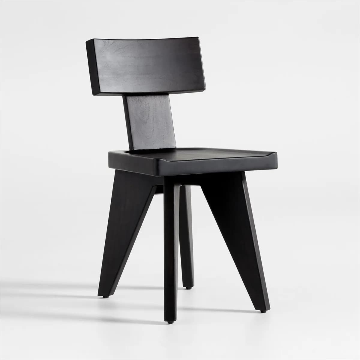 A modern, minimalist dining chair made from black-stained wood, featuring a geometric design with a rectangular backrest and stout, tapered legs. The chair has a sculptural and architectural aesthetic. — 3D model