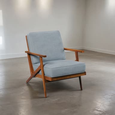 A Mid-Century Modern armchair featuring an exposed wooden frame and light blue-grey upholstered cushions for the seat and backrest. The design emphasizes clean lines and a minimalist aesthetic. — 3D model