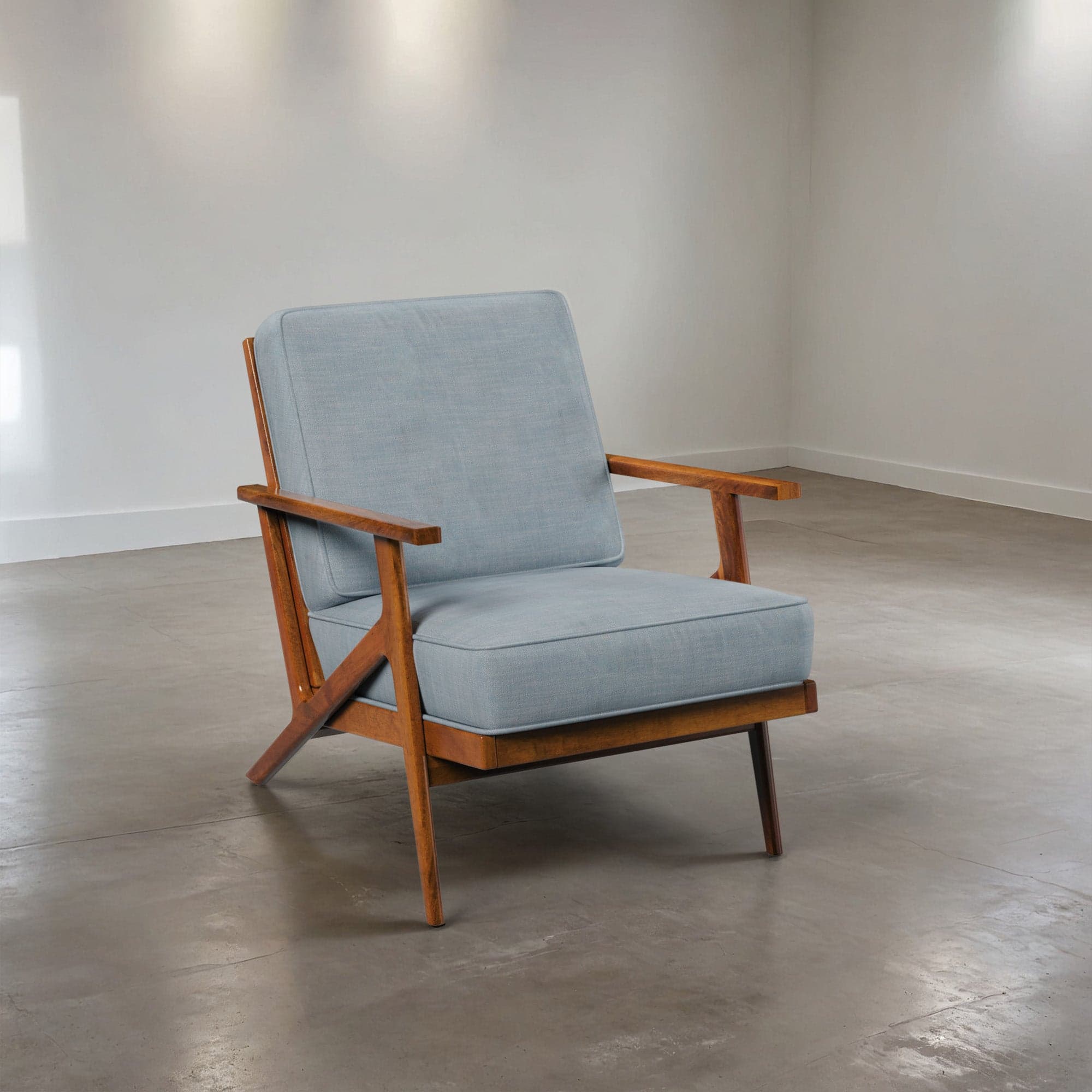 A Mid-Century Modern armchair featuring an exposed wooden frame and light blue-grey upholstered cushions for the seat and backrest. The design emphasizes clean lines and a minimalist aesthetic. — 3D model