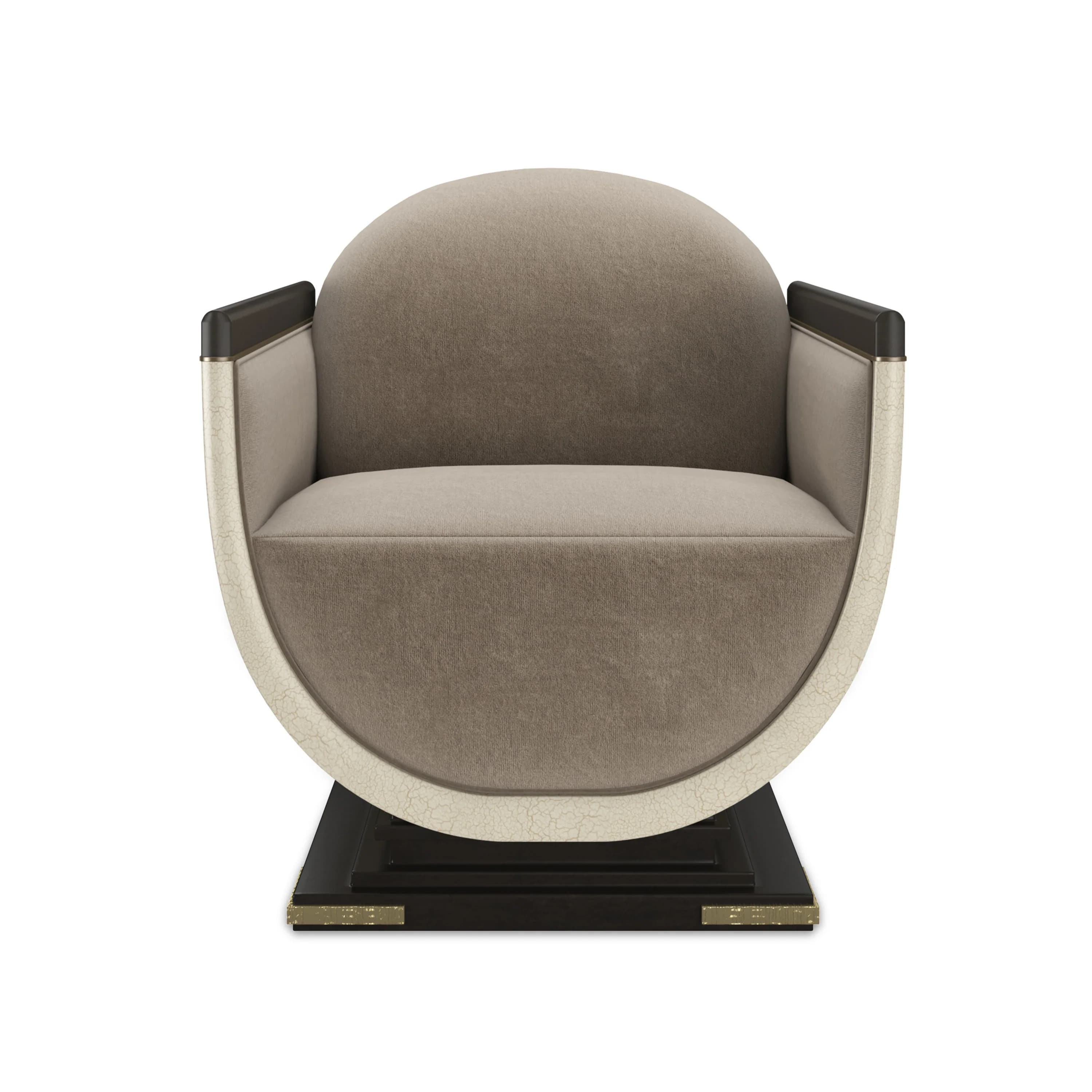 An Art Deco inspired barrel-shaped accent chair, featuring a plush upholstered interior in a neutral beige/taupe fabric, contrasting with a craquelure-finished exterior shell. The chair includes dark wood armrests with a slight sheen and sits on a squared, dark-colored plinth base accented with brass details on each side. — 3D model