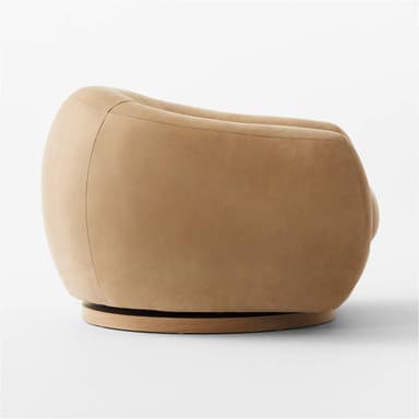 A contemporary armchair with a rounded, barrel-shaped silhouette. It features a low-profile design with generously padded upholstery and a swivel base. The base is a circular wooden platform, likely designed for 360-degree rotation. The overall form is soft and inviting, with seamless upholstery transitions. — 3D model