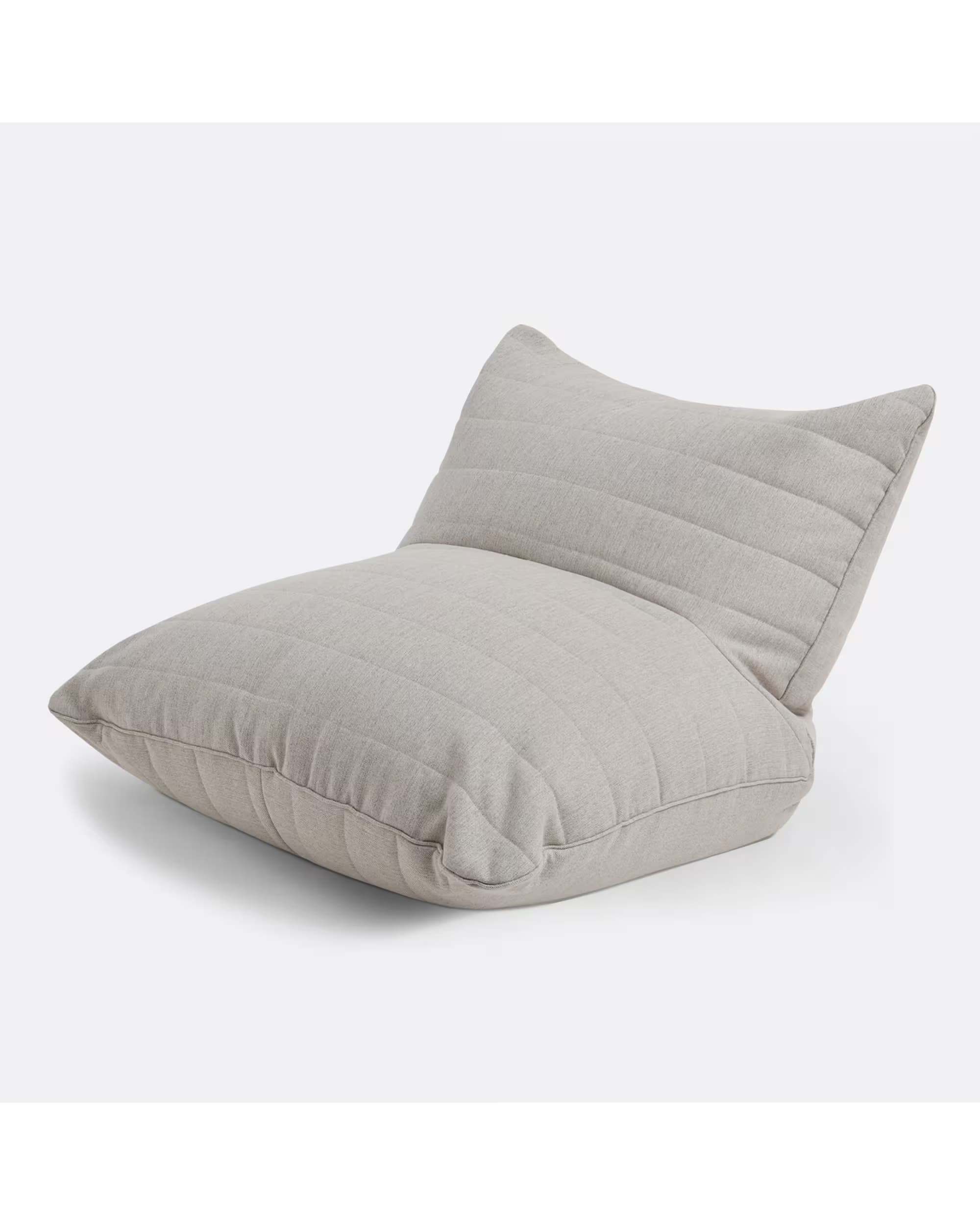 A contemporary bean bag chair with a low profile and an ergonomic design. It features a channel-stitched pattern on the backrest and seat, giving it a structured yet soft appearance. The filling appears to be flexible, allowing the chair to conform to the sitter's body. — 3D model