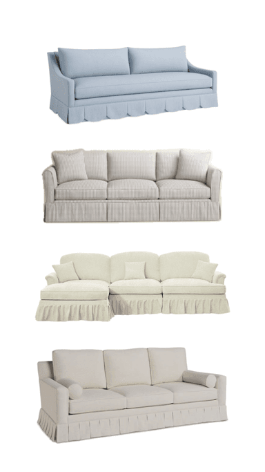 A three-seater sofa featuring a full skirted base, straight track arms, and upholstered in a light-colored fabric. It includes three individual seat cushions, three back cushions, and two cylindrical bolster pillows on the arms. — 3D model