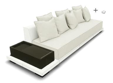 A contemporary, low-profile sofa with a modular design. It features a white base frame and a large, flat seat cushion. Several rectangular, off-white throw pillows are arranged against the back. A dark brown, rectangular side table is attached to the left side of the sofa. The overall aesthetic suggests an outdoor or lounge setting. — 3D model