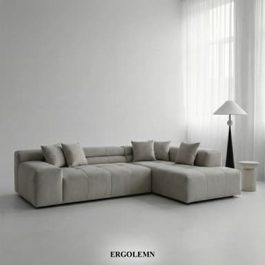 A light gray modular L-shaped sectional sofa with deep button tufting and loose back cushions, featuring a contemporary, minimalist design. — 3D model