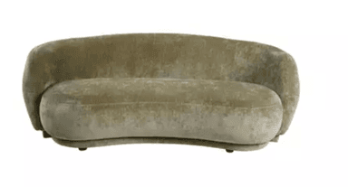 A contemporary curved loveseat upholstered in a textured pale olive green velvet, featuring a low, rounded back and integrated armrests, embodying a plush and seamless modern aesthetic. — 3D model