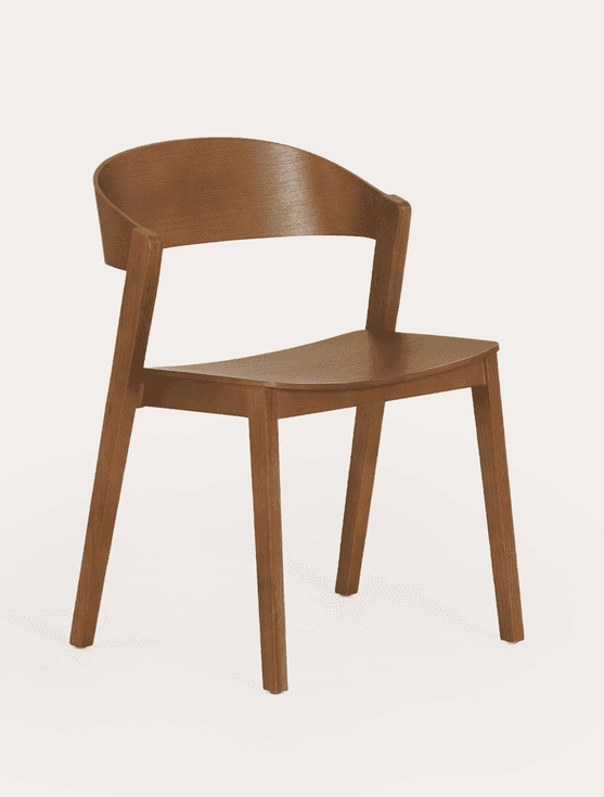 A modern dining chair constructed entirely from wood, featuring a gracefully curved backrest that integrates into subtle armrests, and a solid, contoured seat supported by four tapered legs. — 3D model