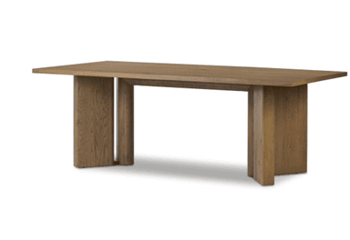 A long, rectangular dining table made of light brown wood, featuring a thick tabletop and two sturdy, rectangular block-like bases. — 3D model