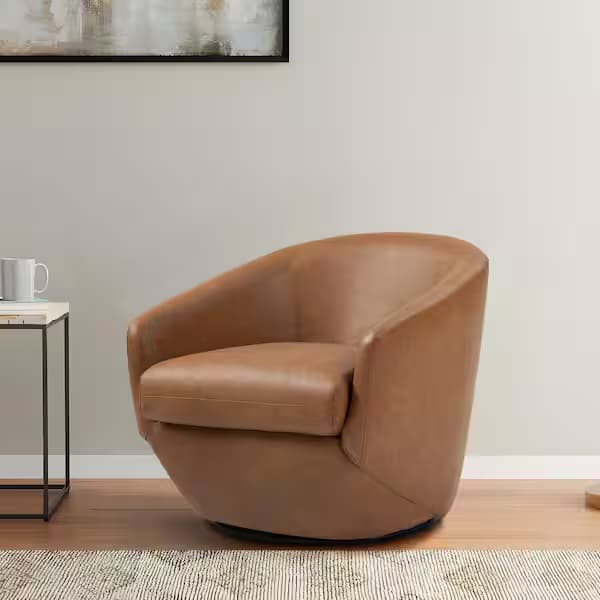 A modern barrel-back swivel armchair upholstered in tan or caramel-colored leather, featuring a low profile and a discreet black circular swivel base. — 3D model