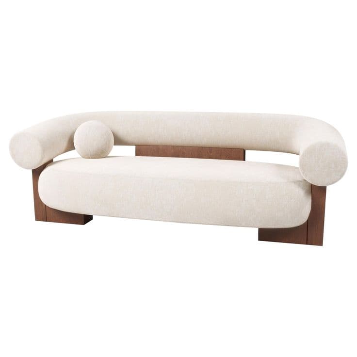 A modern loveseat featuring a distinctive tubular backrest and armrests that form a continuous, sculptural curve. The seating surface is a single, thick cushion upholstered in a light-colored, textured fabric, supported by a solid wooden base. A small, spherical bolster cushion is positioned on the backrest. — 3D model