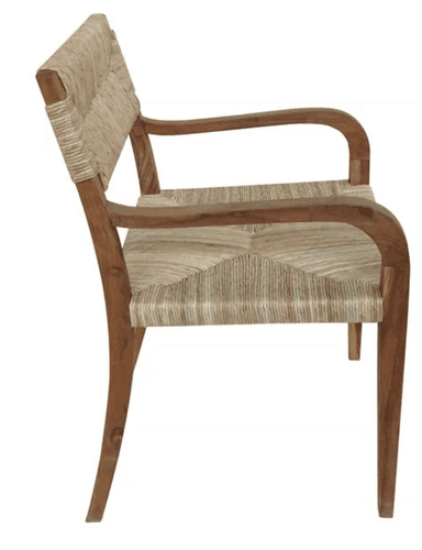 A wooden armchair with a woven seat and backrest. The frame is constructed from dark brown wood, exhibiting a natural grain pattern. The seat and back are made of tightly woven natural fibers, likely rush or seagrass, in a light beige to tan color. The armrests are curved and flow smoothly from the back supports to the front legs. The legs are straight and taper slightly towards the bottom. — 3D model