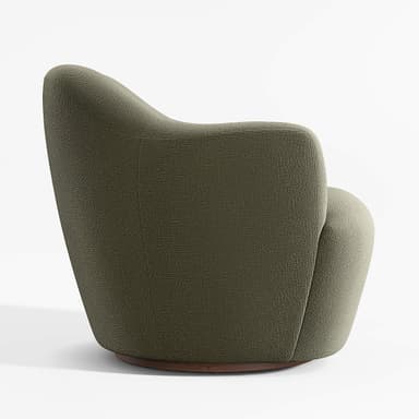 A fully upholstered armchair with a rounded, organic silhouette. The chair features a high, sculpted backrest that flows into integrated armrests, creating a cohesive form. A single button is tufted into the center of the backrest. The chair is supported by a dark, circular wooden base, suggesting it may be a swivel chair. — 3D model