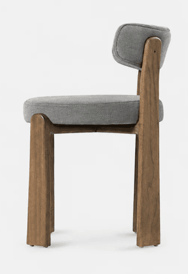 An armless chair featuring a robust dark brown solid wood frame and light gray fabric upholstery on the seat and backrest. The design is minimalist with clean lines, showcasing a contemporary aesthetic. The backrest is attached to vertical wooden supports that extend upwards from the rear legs, creating a visually integrated structure. The seat and back cushions are well-padded and have softly rounded edges. — 3D model