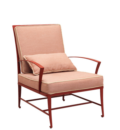 An armchair with a slender metal frame and upholstered cushions. The frame is made of thin, bent metal tubes in a reddish-brown hue. The seat, backrest, and a small decorative pillow are covered in a textured, light pinkish-brown fabric with a subtle woven pattern. The cushions are outlined with a thin, cream-colored piping. The armchair has a modern, minimalist design. — 3D model