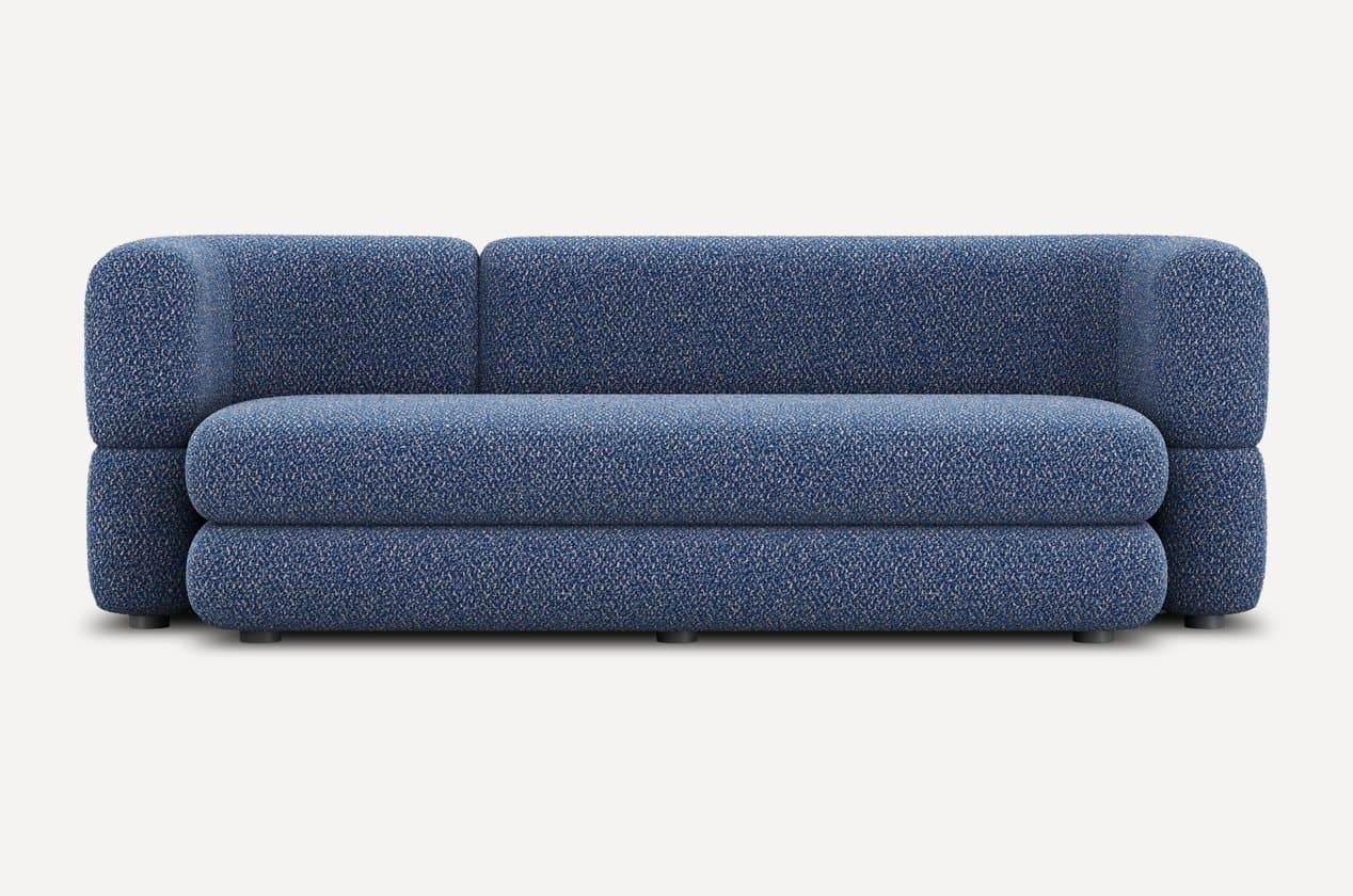 A low-profile, modular sofa with rounded edges and a textured fabric upholstery. The sofa appears to be constructed from densely packed foam or similar cushioning material. It features a distinct layered design for both the seat and backrest. Small, dark cylindrical legs support the base. — 3D model