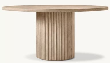 A contemporary round dining table featuring a light wood finish and a distinctive vertically fluted cylindrical pedestal base. — 3D model