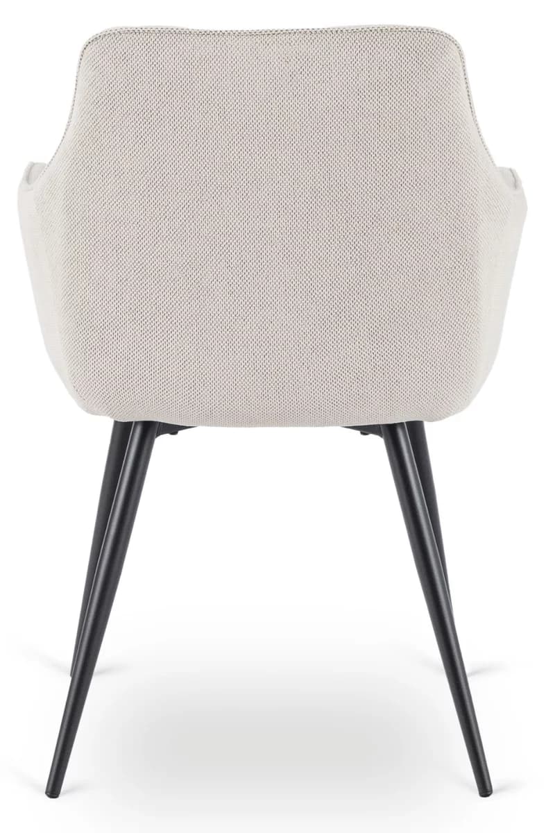 A contemporary dining chair featuring a light-colored, textured fabric upholstery and slender black metal legs. The chair has a gently curved backrest that seamlessly integrates into subtle armrests, forming a bucket-style seat. The visible texture of the fabric appears to be a knit or woven pattern, providing a soft aesthetic contrast to the minimalist metal base. The legs are splayed for stability and extend downwards in a clean, tapered profile. — 3D model