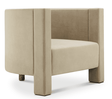A contemporary armchair with a boxy silhouette and a plush velvet upholstery in a neutral beige tone. The armchair features a high back and armrests that are integrated into the main body, creating a continuous form. The front legs are block-shaped and upholstered, while the rear legs appear to be a decorative, metallic material with an irregular texture. — 3D model