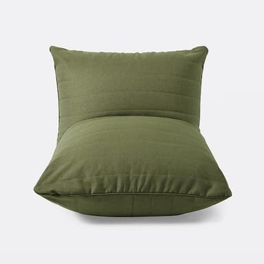 A low-profile, floor-sitting armchair upholstered in a textured olive green fabric. The chair features a segmented design with horizontal stitching across both the seat and backrest, creating a cushioned effect. Its form suggests a relaxed, informal seating option. — 3D model