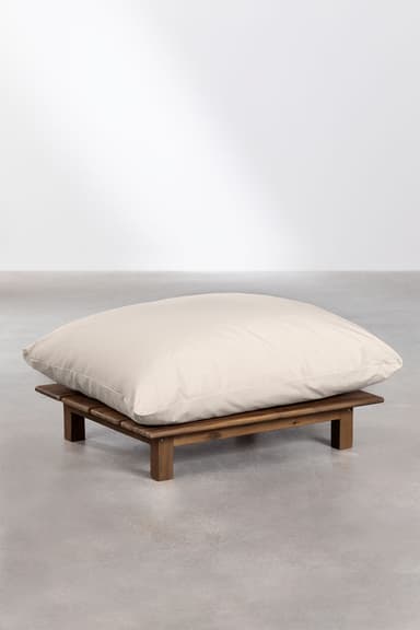 A low-profile ottoman with a wooden slatted base and a large, plush, cream-colored cushion. The base appears to be constructed from dark wood planks laid horizontally and supported by four short, block-style legs. The cushion is generously filled and contours to the base, suggesting a comfortable, oversized design. The overall aesthetic leans towards a relaxed, possibly outdoor or bohemian style. — 3D model