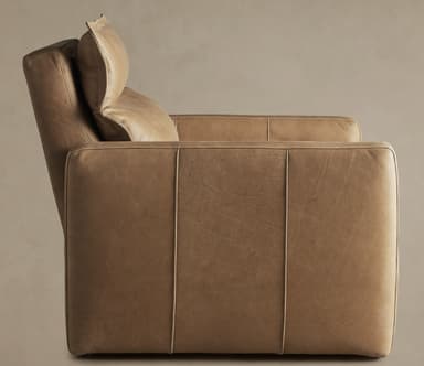 A contemporary recliner armchair upholstered in a tan or camel-colored leather, featuring thick cushioning, square-profile arms, and visible topstitching. — 3D model