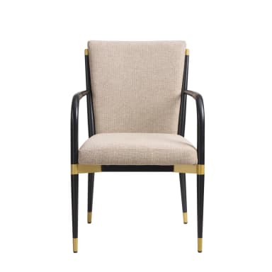 A contemporary upholstered armchair featuring a black metal frame with brass details and beige fabric upholstery. The chair has a sleek, modern design with integrated curved armrests. — 3D model