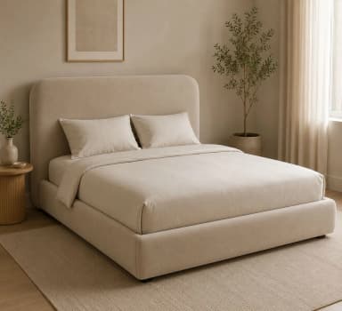 A contemporary upholstered platform bed featuring a clean, minimalist design. The bed includes an integrated headboard with softly rounded corners and a low-profile frame, all covered in a neutral beige fabric. It is shown with matching bedding and pillows. — 3D model