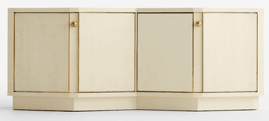 A long, low sideboard cabinet featuring a cream-colored lacquered finish and brass hardware. The facade is subtly segmented with four cabinet doors, each framed by brass trim. The cabinet sits on a recessed plinth base that follows the slight inward curve of the segmented front, giving it a distinctive postmodern appearance. — 3D model