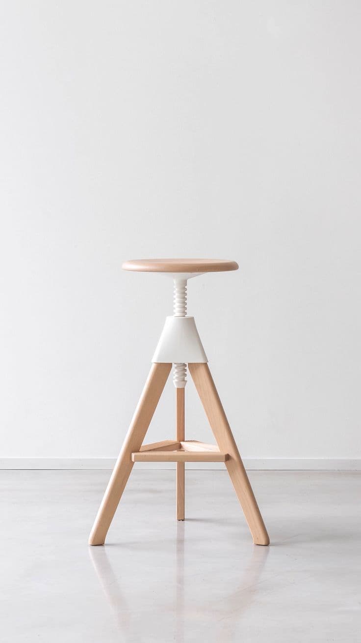 A modern bar stool with a natural wood seat and a tripod base constructed from wood. The height of the stool appears to be adjustable via a visible screw mechanism, with a white conical support element. — 3D model