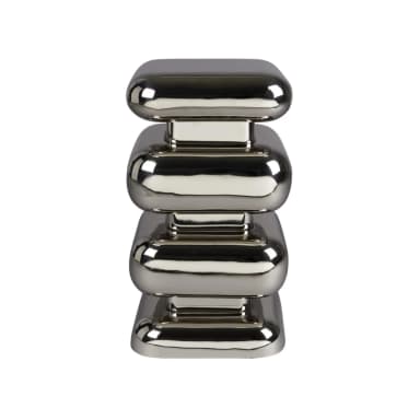 A side table with a stacked, abstract design. The structure consists of four rounded, square-like blocks stacked vertically. Each block is slightly indented from the one below it, creating a tiered effect. The overall form is smooth and highly reflective, with a polished chrome finish. — 3D model