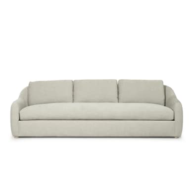 A three-seater sofa with a curved armrest on the left side. The sofa has a tailored base and three seat cushions. The back features three distinct cushions, all upholstered in a light-colored, textured fabric. — 3D model