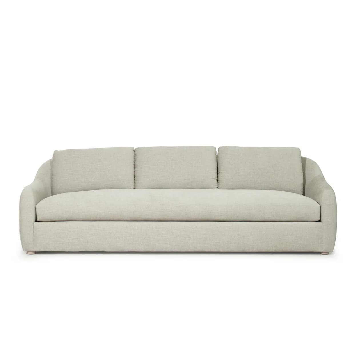 A three-seater sofa with a curved armrest on the left side. The sofa has a tailored base and three seat cushions. The back features three distinct cushions, all upholstered in a light-colored, textured fabric. — 3D model