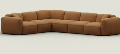 An L-shaped, modular sectional sofa upholstered in a warm camel brown microsuede-like fabric. The sofa features a soft, rounded profile with plush, integrated seat and back cushions. It consists of multiple segments, including corner and armrest pieces, creating a cohesive, inviting seating arrangement. The design is low-slung and minimalist, emphasizing comfort. — 3D model