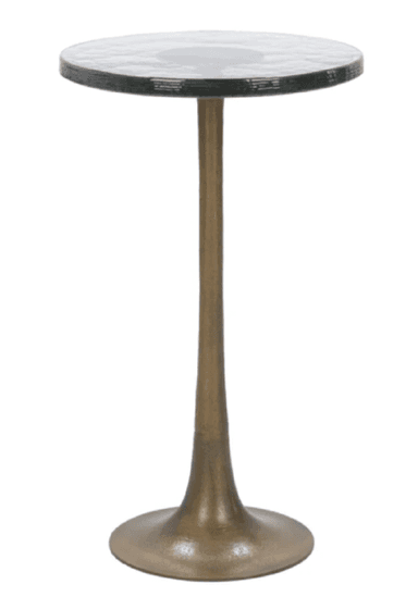 A tall, slender accent table featuring a round, textured glass top supported by a single, tapering metal pedestal base with a trumpet-shaped foot. The metal base has a muted, antiqued brass or bronze finish. The glass top appears to have an organic, rippled texture. — 3D model