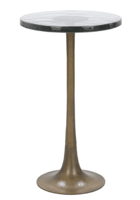 A tall, slender accent table featuring a round, textured glass top supported by a single, tapering metal pedestal base with a trumpet-shaped foot. The metal base has a muted, antiqued brass or bronze finish. The glass top appears to have an organic, rippled texture. — 3D model