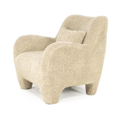 A cream-colored armchair with a rounded silhouette, upholstered in a textured fabric resembling boucle or sherpa. It features broad, enveloping arms, a high back, and four short, chunky legs. A small, square throw pillow with matching upholstery is placed on the seat against the back. — 3D model