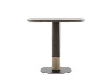 A modern side table featuring a dark wood finish on its tabletop and upper pedestal, contrasted with a lighter, textured material on the lower pedestal, all supported by a flat, dark rectangular base with rounded corners. — 3D model