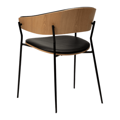 A modern accent chair featuring a curved black upholstered backrest and seat, supported by a thin, black metal frame. The chair has a distinctive curved wooden accent on the sides of the backrest, providing a contrast in materials and color. The legs are slender and angled outwards. — 3D model