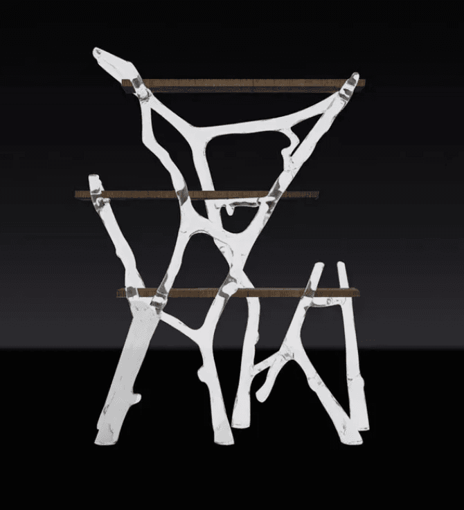 A freestanding multi-tiered display shelf featuring an organic, branch-like polished metal frame and four rectangular wooden shelves. The frame has a fluid, sculptural appearance, supporting the dark-toned display surfaces. — 3D model