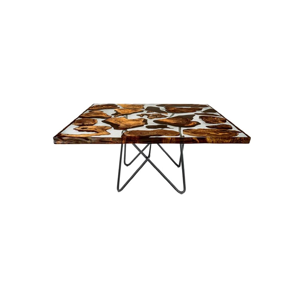 A square coffee table featuring a unique tabletop made of wood fragments embedded in clear resin. The tabletop has a glossy finish and irregular edges where the wood pieces are visible. The table is supported by a set of black metal hairpin legs, forming an X-shape structure. — 3D model