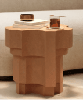 A modern accent table with a stepped, geometric design. The top surface is octagonal with inward curved edges, and the body consists of stacked cylindrical segments that decrease in diameter towards the base, also featuring curved cutouts. The overall form is sculptural and contemporary. — 3D model