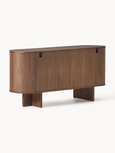 A mid-century modern inspired cabinet with a rounded, cylindrical body and a plinth base. It features two vertically oriented doors with concealed handles and a curved top surface. The material appears to be solid wood with a prominent grain pattern. — 3D model