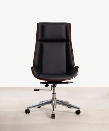 An armless office chair with a molded plywood shell finished in a dark wood veneer, supported by a polished aluminum five-star swivel base with casters. The chair features a high back and a subtly curved seat. — 3D model