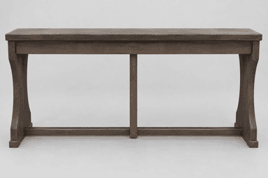 A sturdy, rectangular bench constructed from dark-stained solid wood. It features a thick, flat top surface. The base consists of two substantial, slightly curved end supports that taper inwards towards the bottom, connected by a long horizontal stretcher near the floor. A central vertical support connects this stretcher to the underside of the bench top, providing additional stability. The wood grain is visible throughout the dark finish. — 3D model